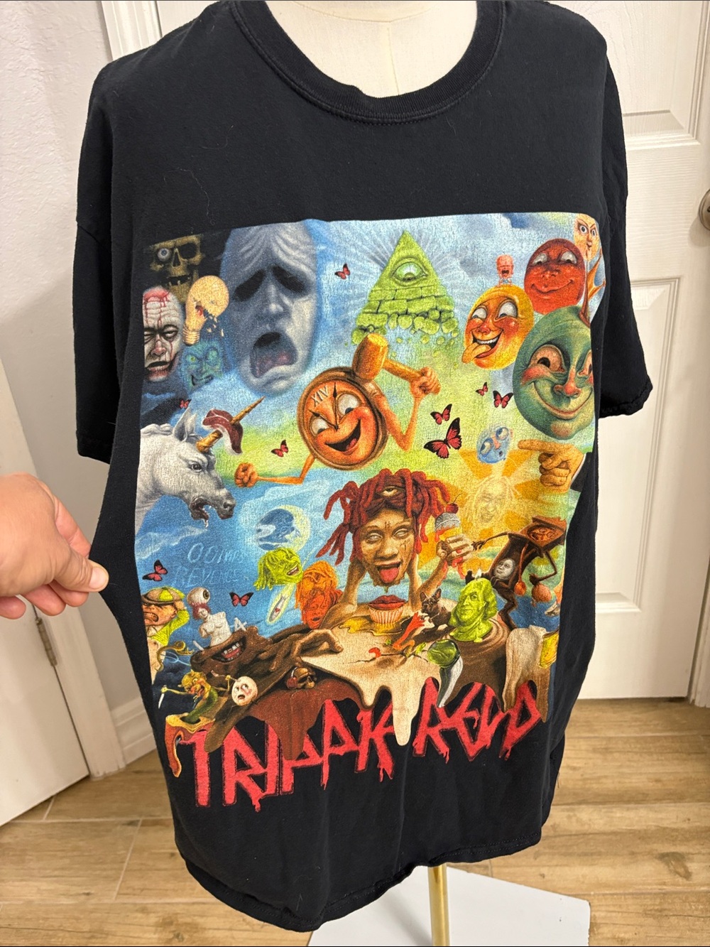 Black Short-Sleeve Graphic Tee with Vibrant Surreal Artwork Trippie Redd